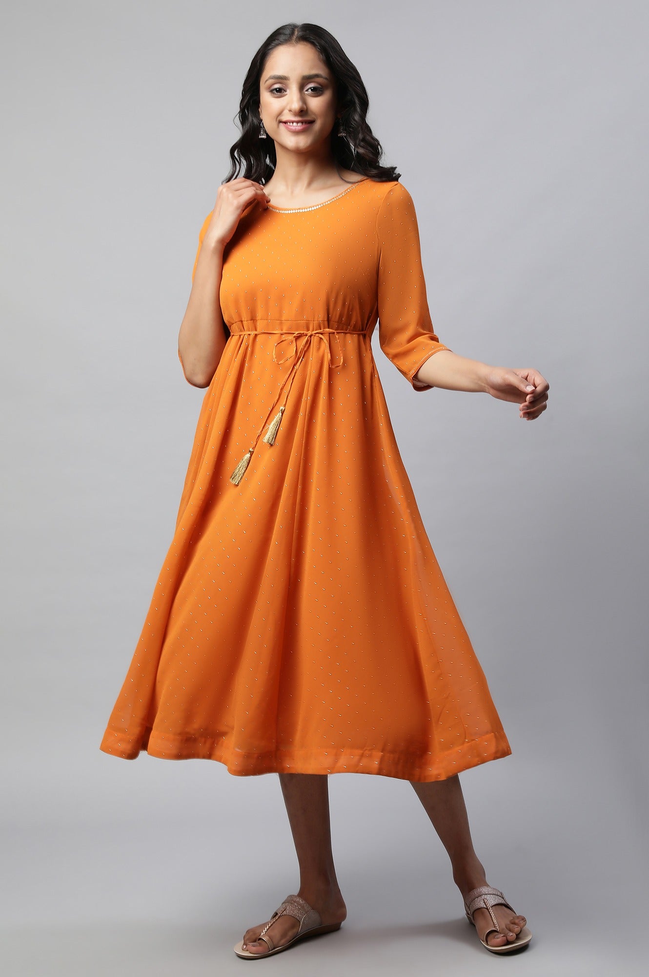 orange flared dress A chic off-shoulder burnt orange dress with a flared silhoutte, for a wedding guest