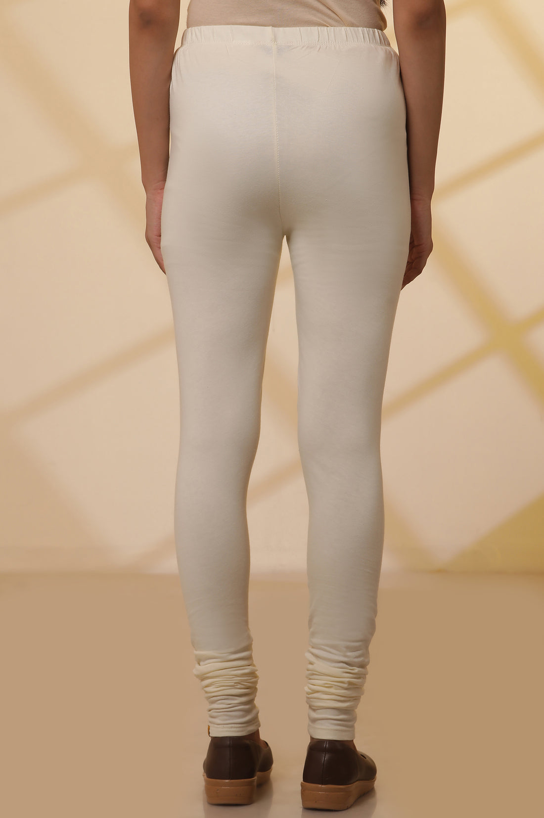 Cream Solid Plain Skinny Cotton Churidar