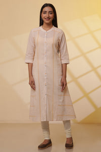 Cream Solid Plain Skinny Cotton Churidar