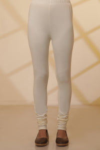 Cream Solid Plain Skinny Cotton Churidar