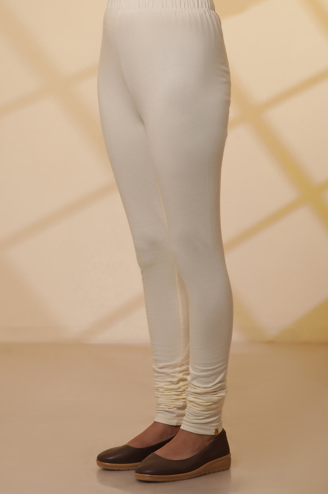 Cream Solid Plain Skinny Cotton Churidar
