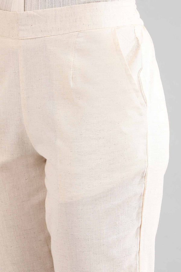 Elleven Women's Beige Solid Straight Fit Cotton Trousers With Elasticated Back