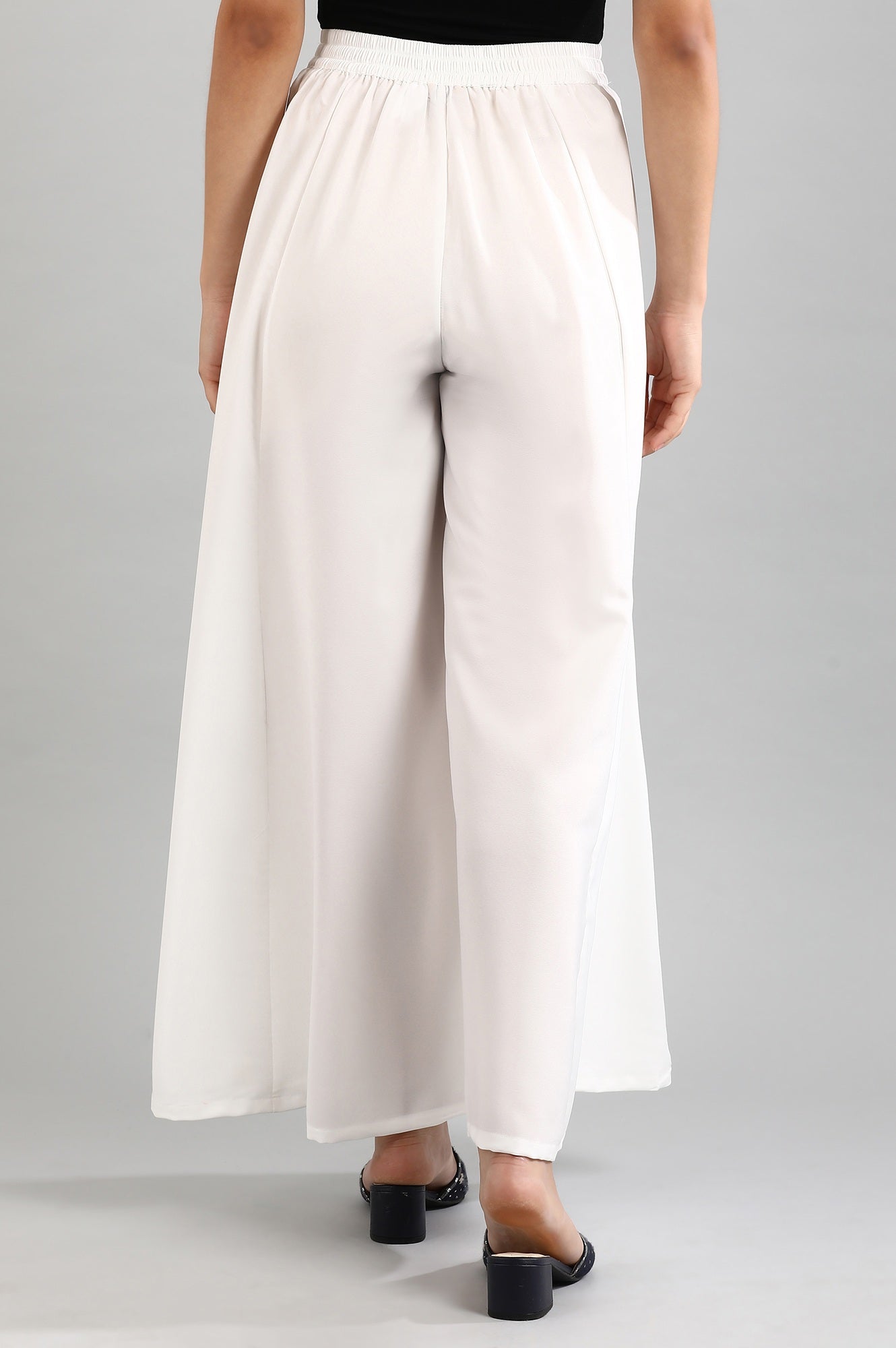 White solid palazzos