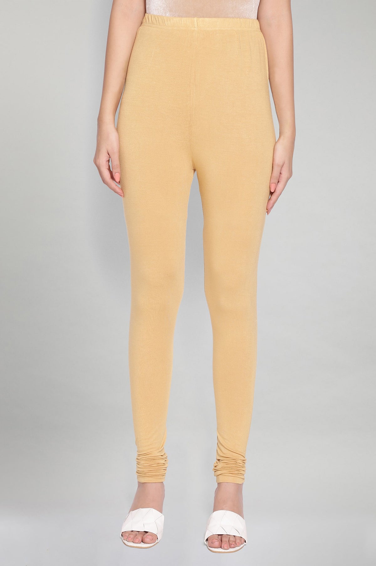 Elleven Women's Gold Solid Knitted Women Churidar - M