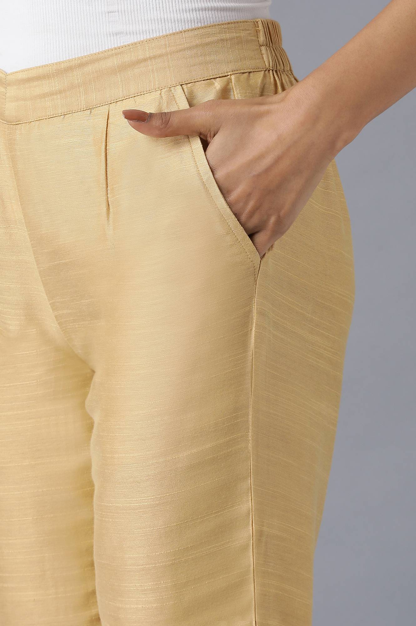 Brown roll-up hem trousers