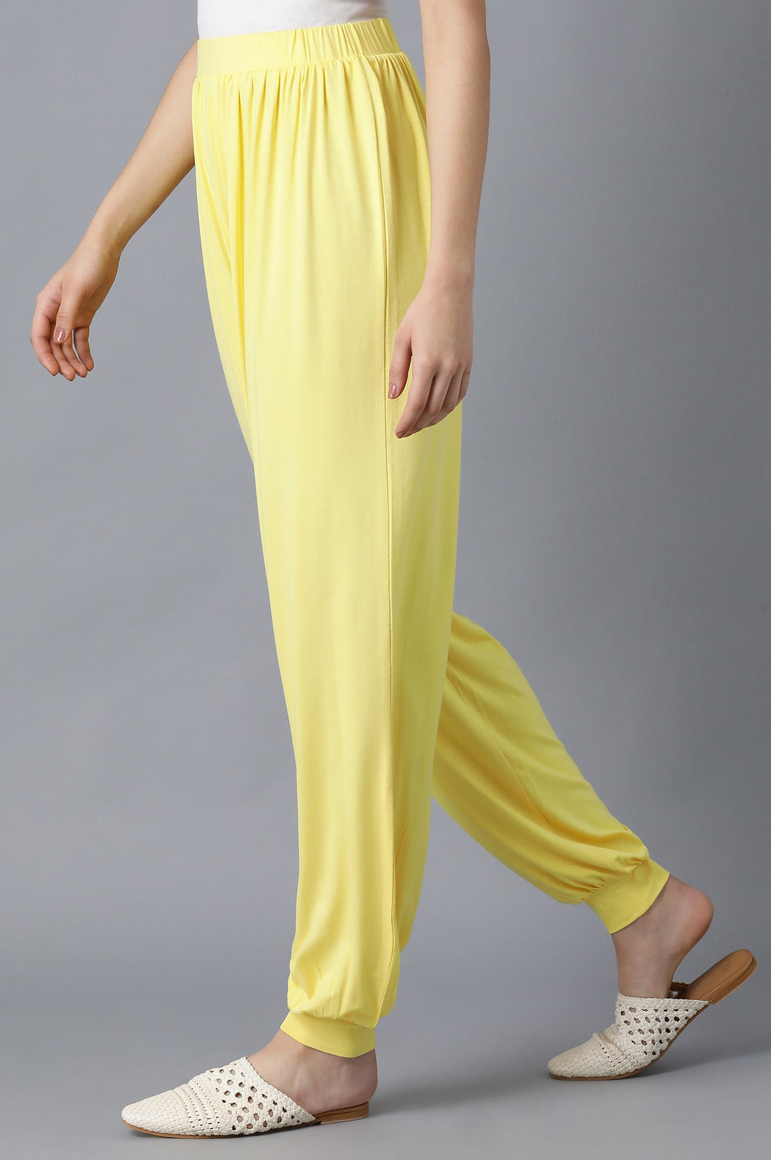 Yellow Solid Flared Pants With Elasticated Waist