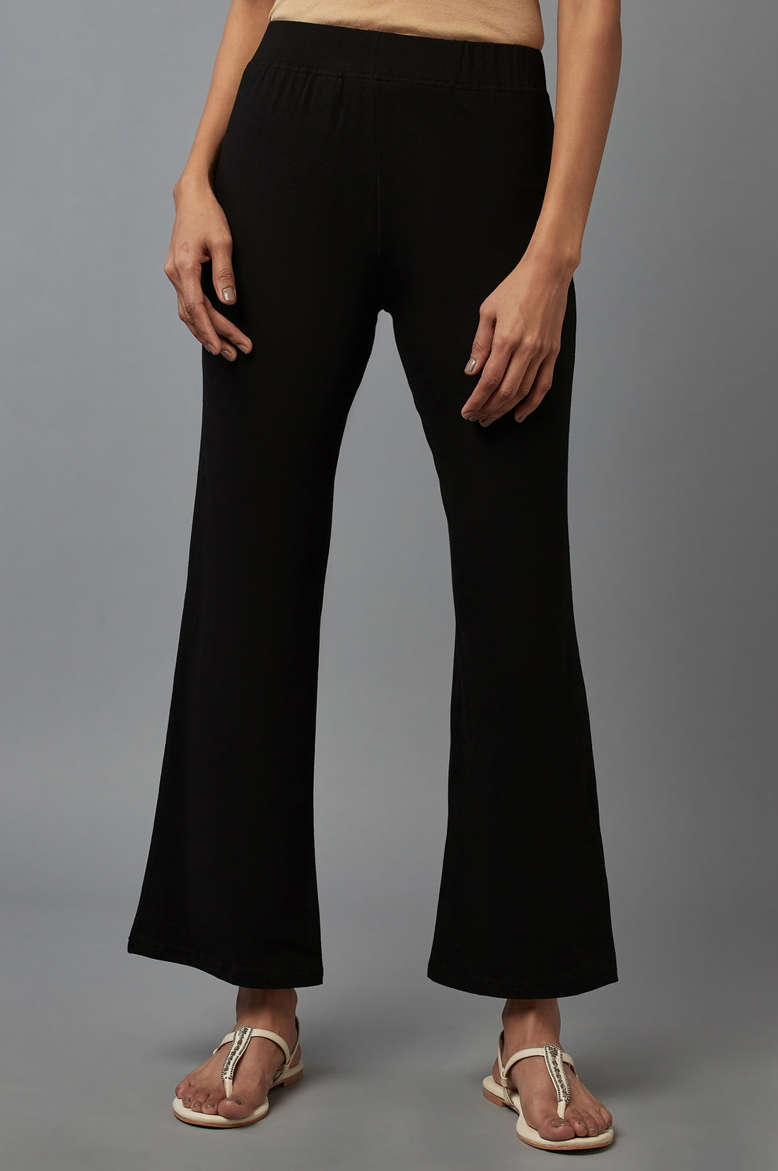 Buy Black Solid Flared Cotton Pants With Slip On Closure Online