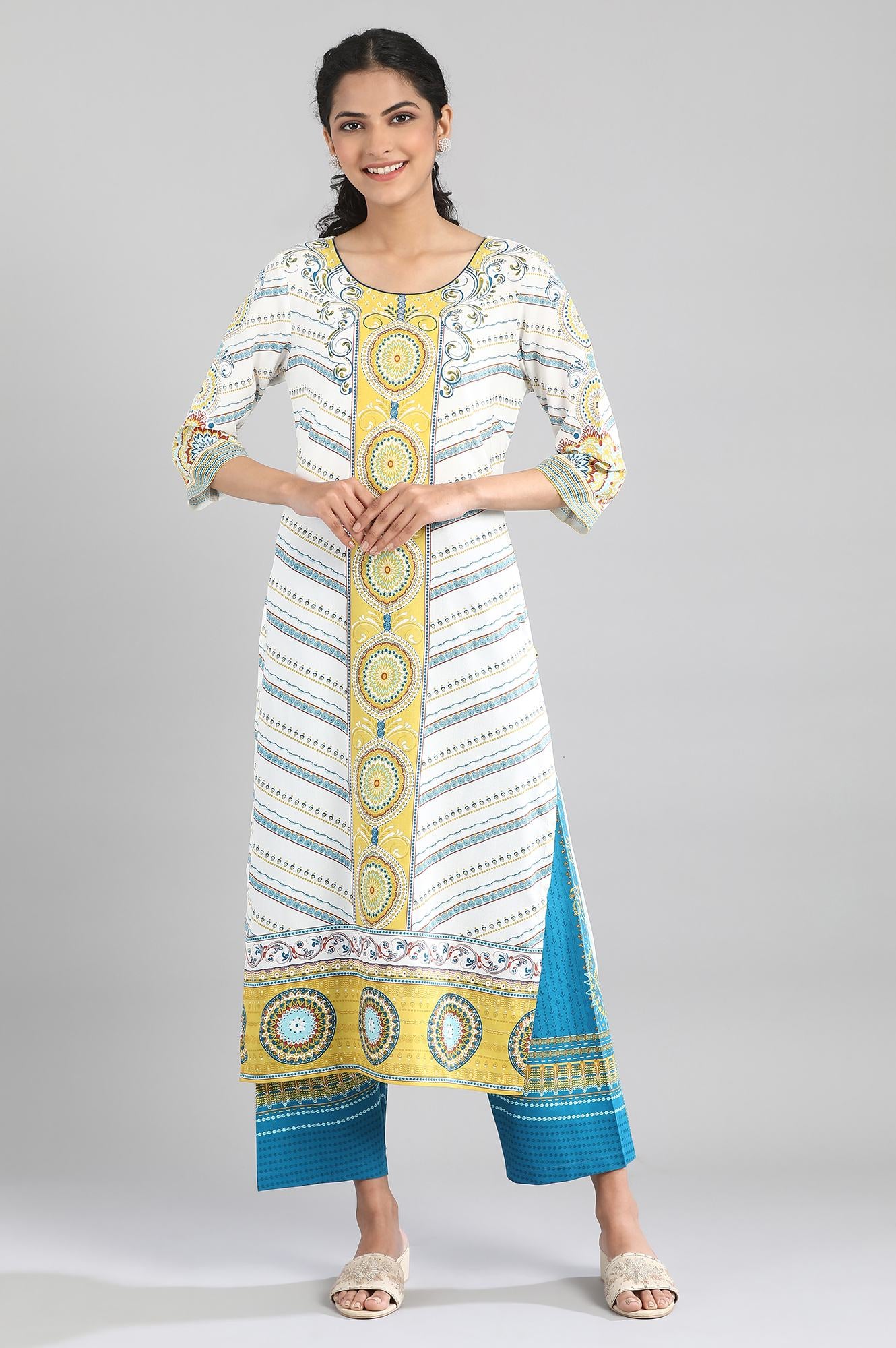 White kurta with blue and yellow prints