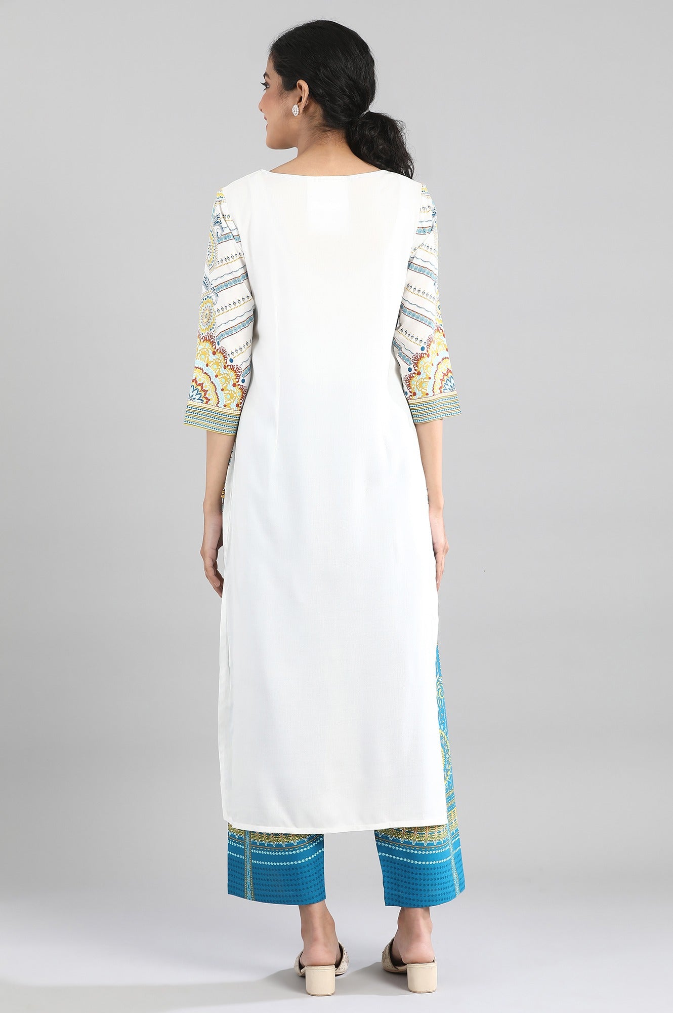 White kurta with blue and yellow prints