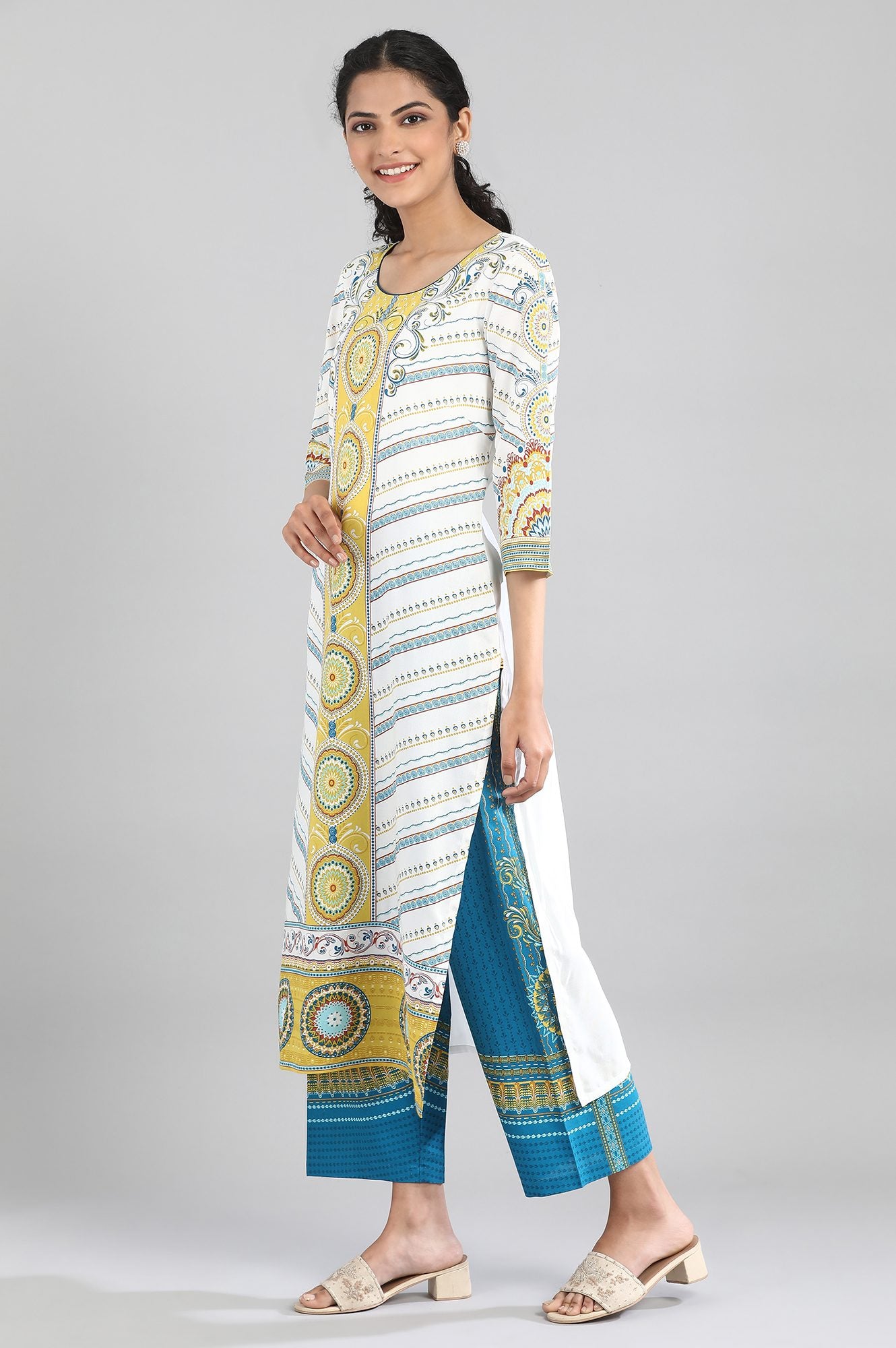 White kurta with blue and yellow prints