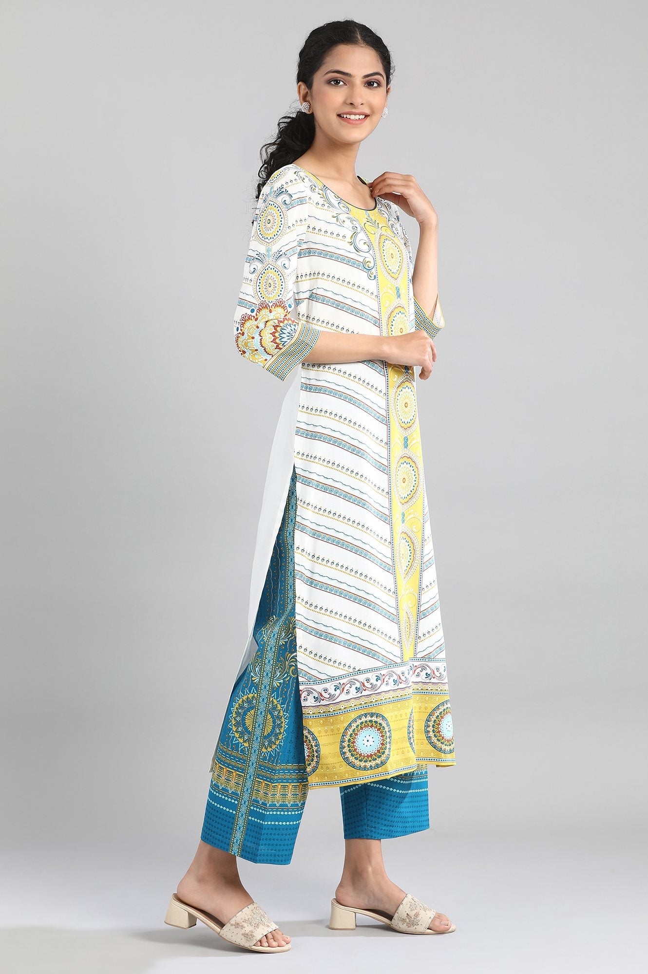 White kurta with blue and yellow prints