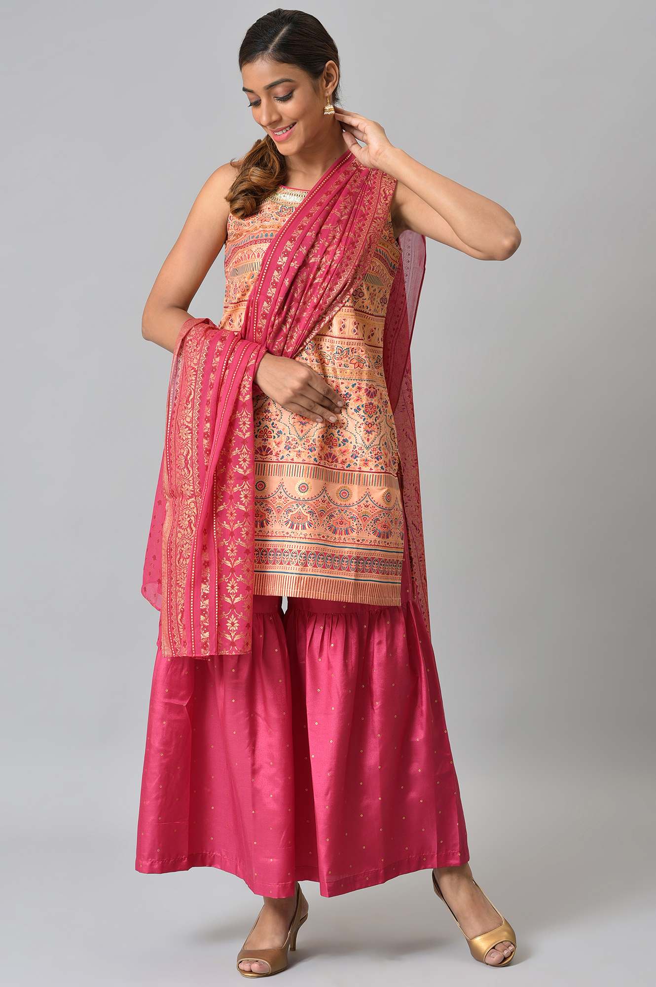 Peach Foil Printed Sleeveless kurta with Pink Sharara and Dupatta