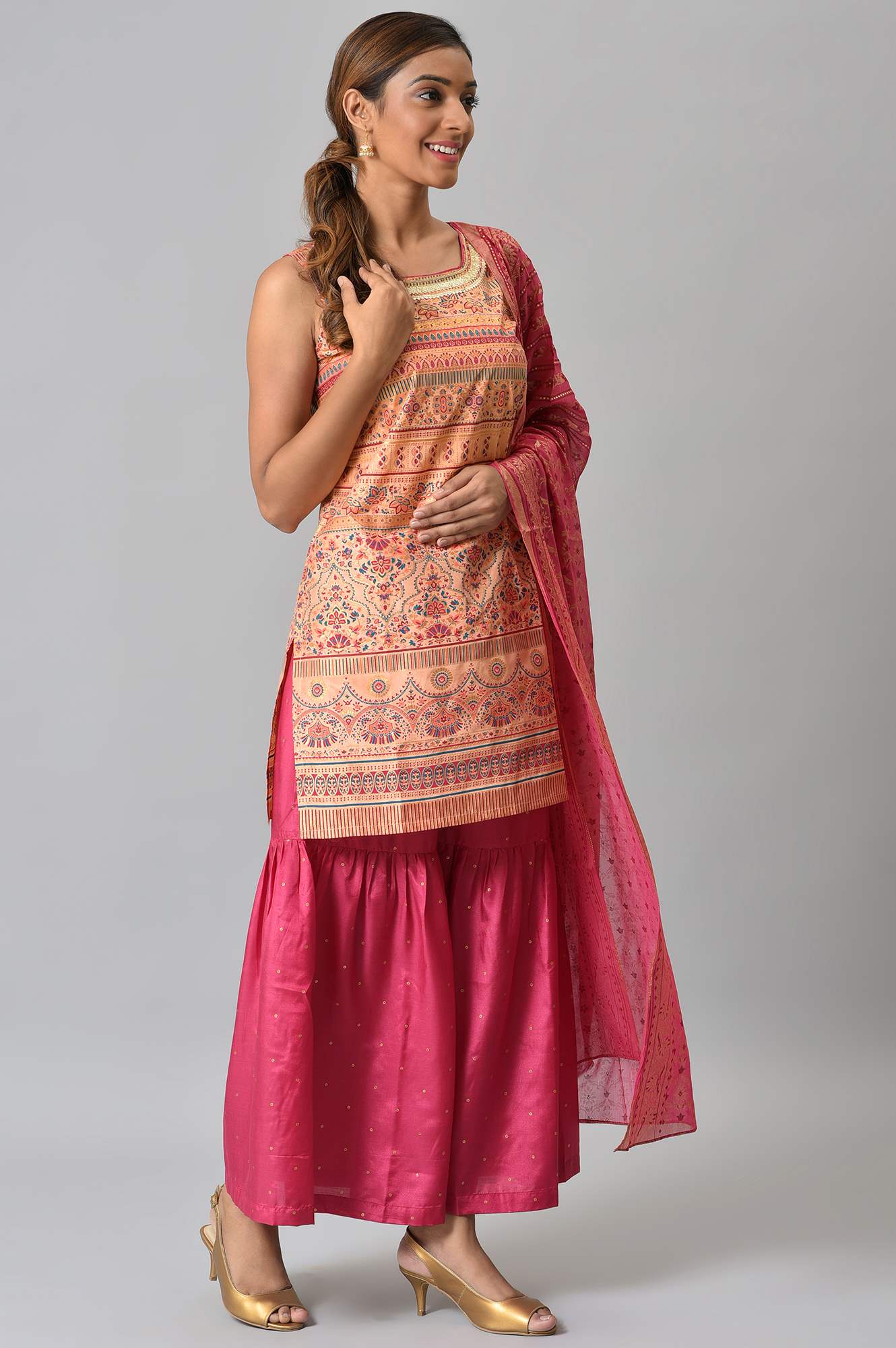 Peach Foil Printed Sleeveless kurta with Pink Sharara and Dupatta