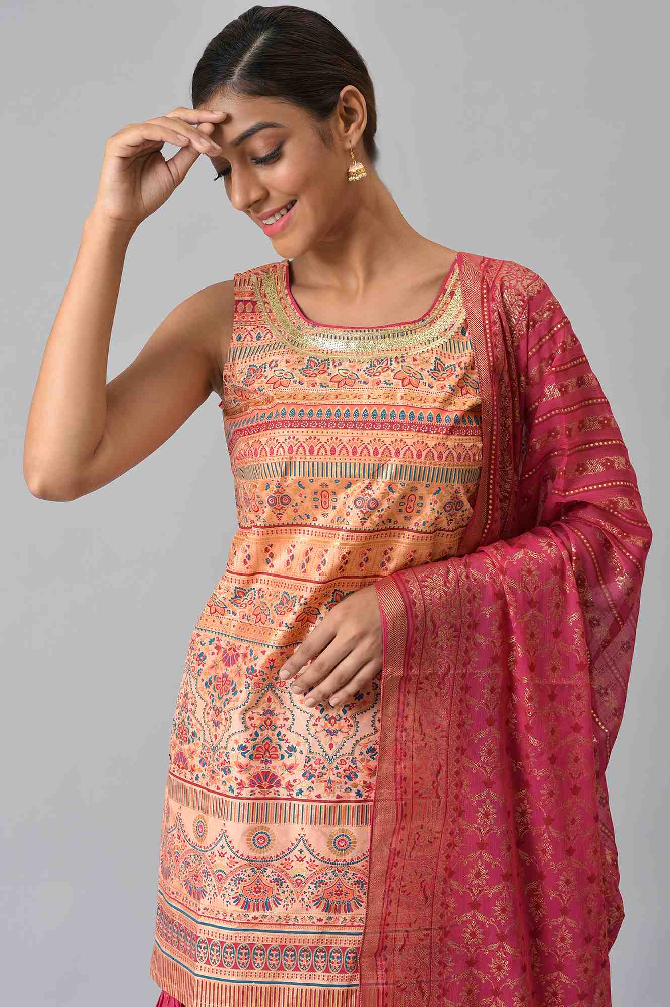 Peach Foil Printed Sleeveless kurta with Pink Sharara and Dupatta