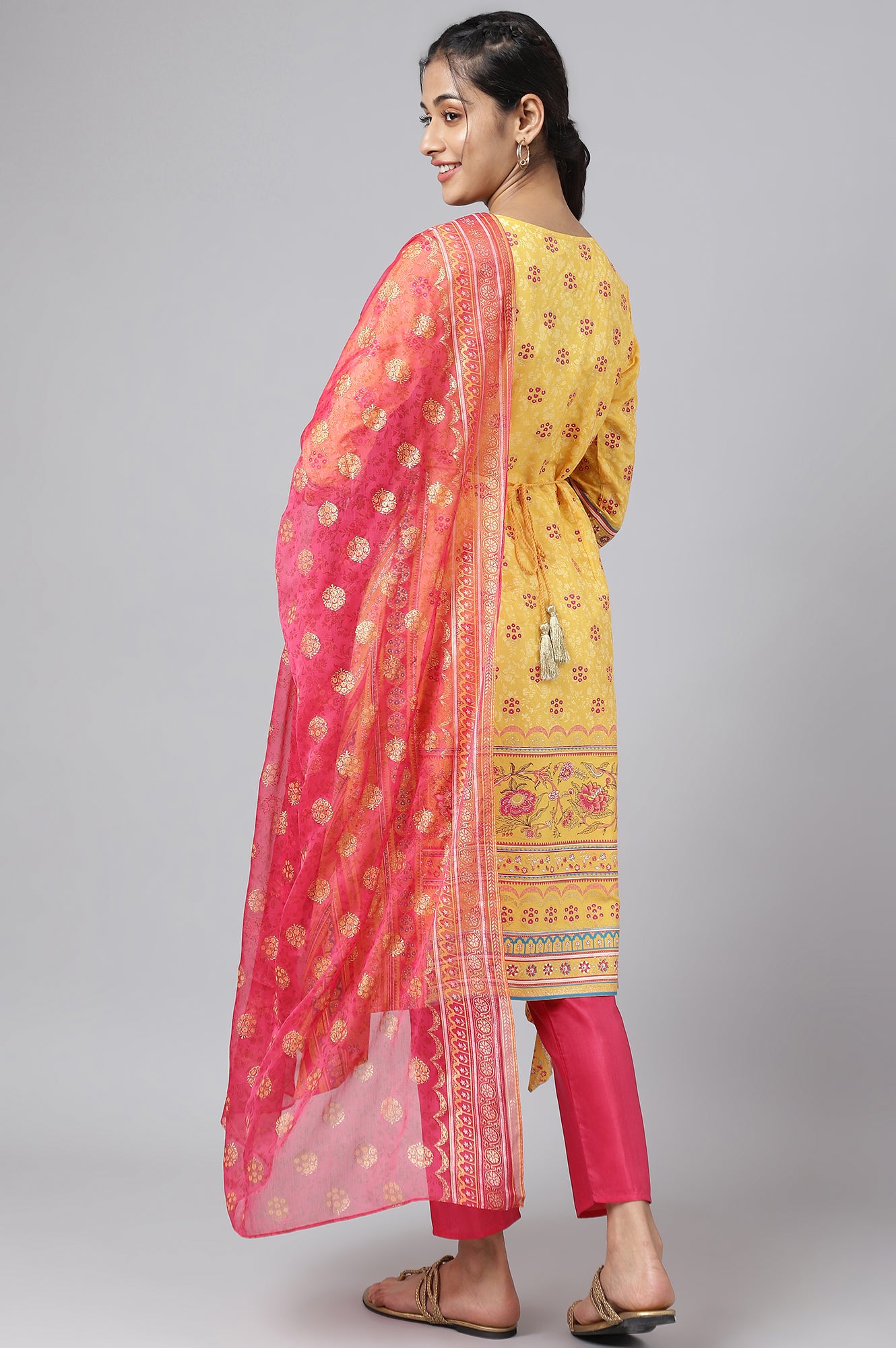 Yellow Asymmetric kurta with Pink Trouser and Dupatta