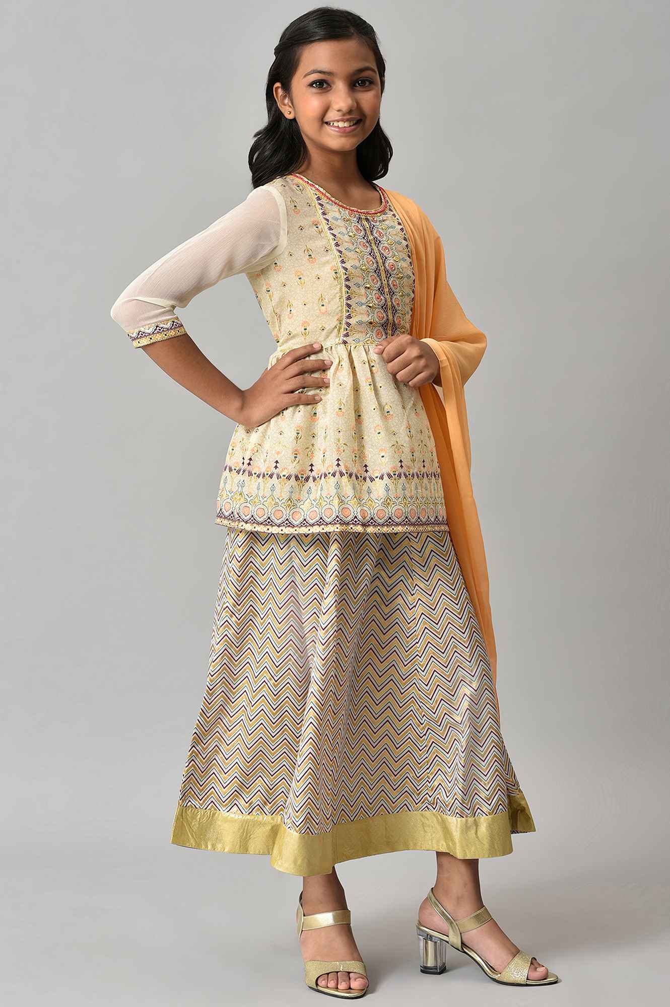 Girls Beige Floral Peplum Top With Skirt And Orange Dupatta