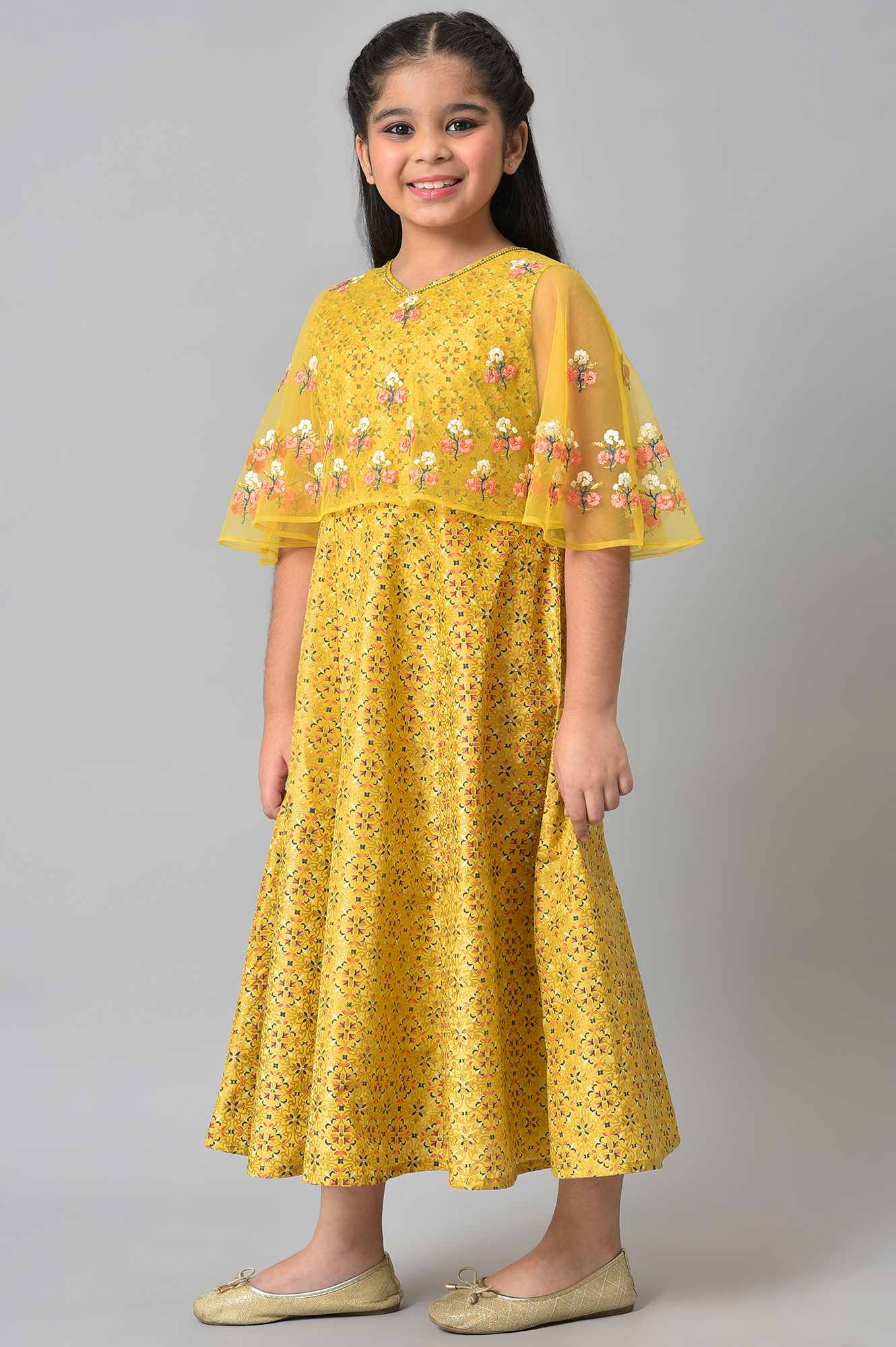 Buy Girls Yellow Dress With Net Layered Cape Online for Woman