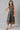 Girls Pink Poly Net Gillet With Black Floral Printed Dress