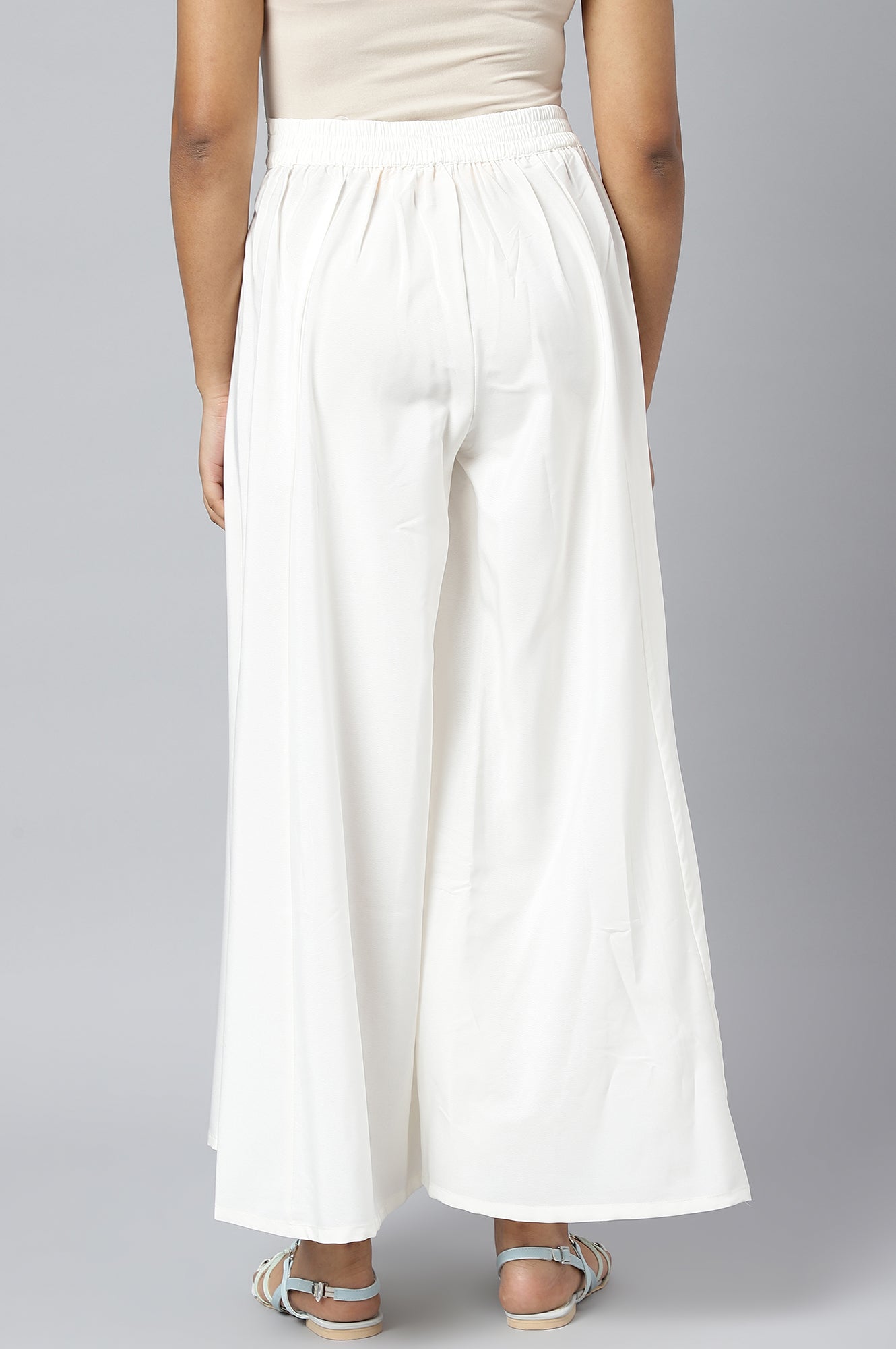 White solid palazzos