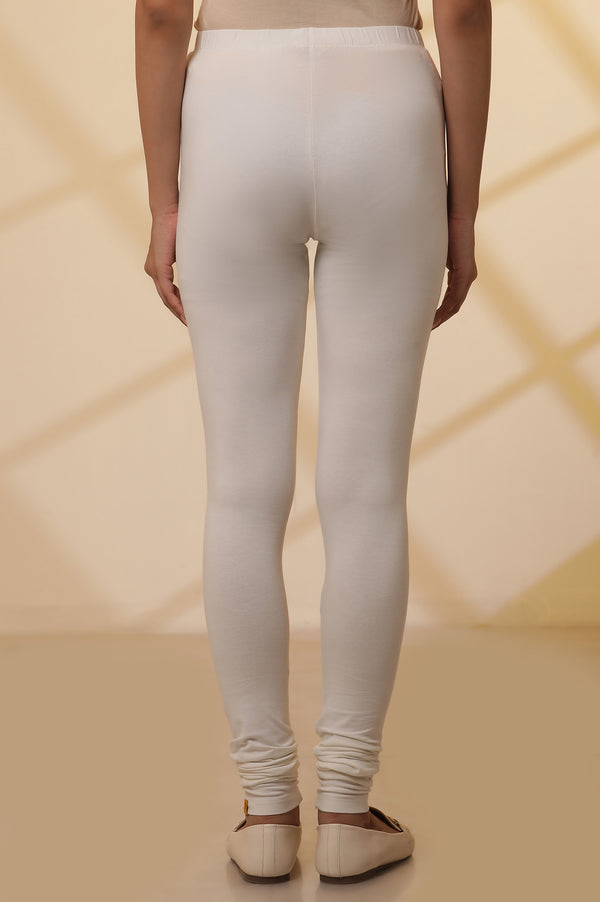 Off-White Solid Ankle Length Cotton Lycra Churidar