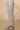 Off-White Solid Ankle Length Cotton Lycra Churidar