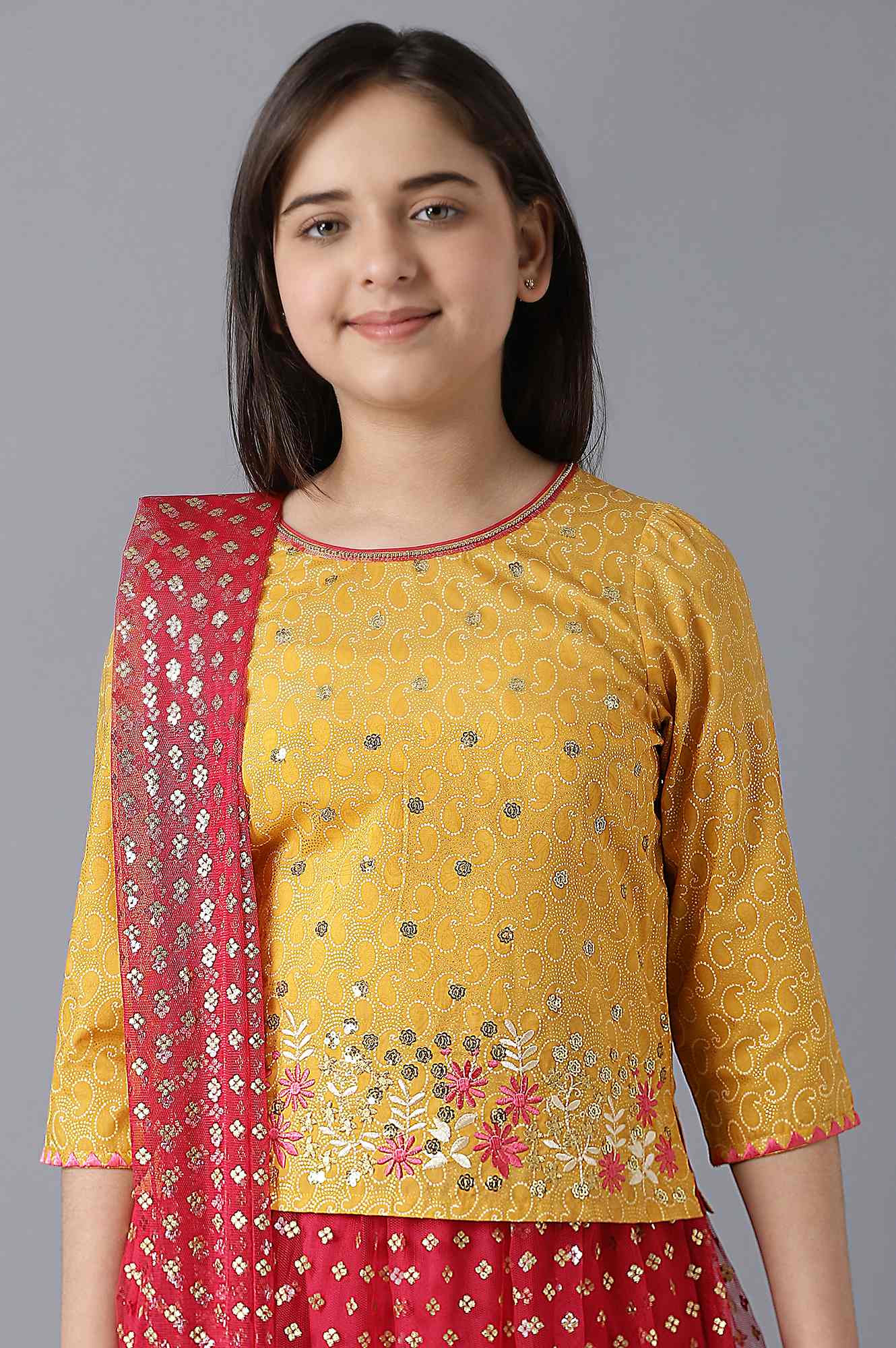 Girls Yellow Foil Printed Top With Red Flared Skirt And Dupatta