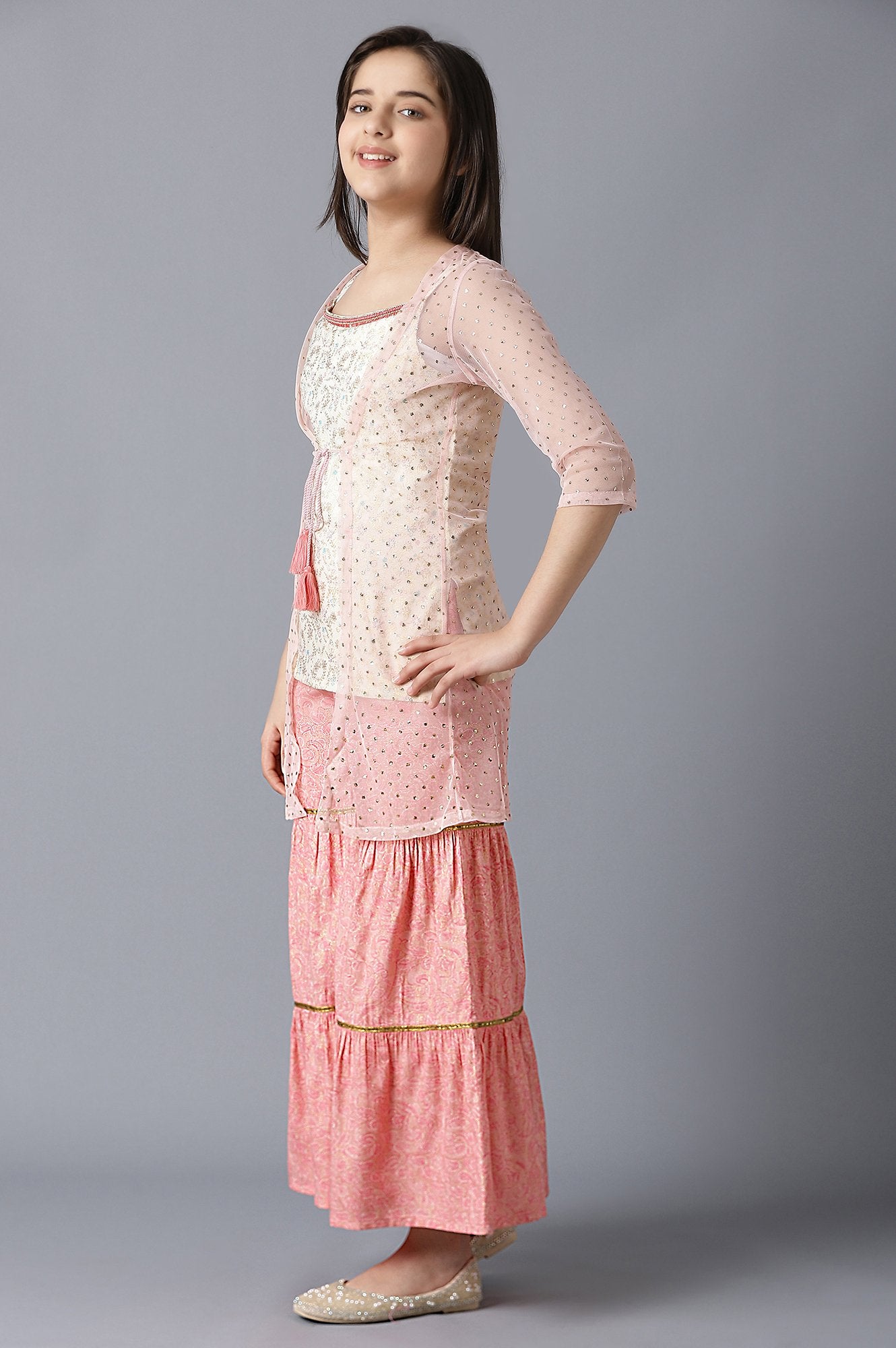 Girls Pink Foil Printed Gillet With Sleeveless White kurta And Pink Flared Skirt