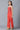 Girls Red Foil Printed Jumpsuit In Boat Neck