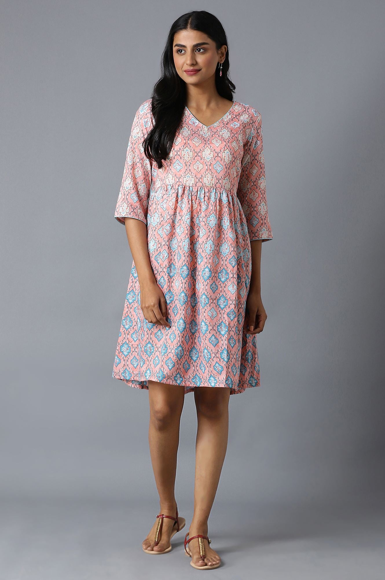 Peach Flared Dress In Floral Print And V-Neck