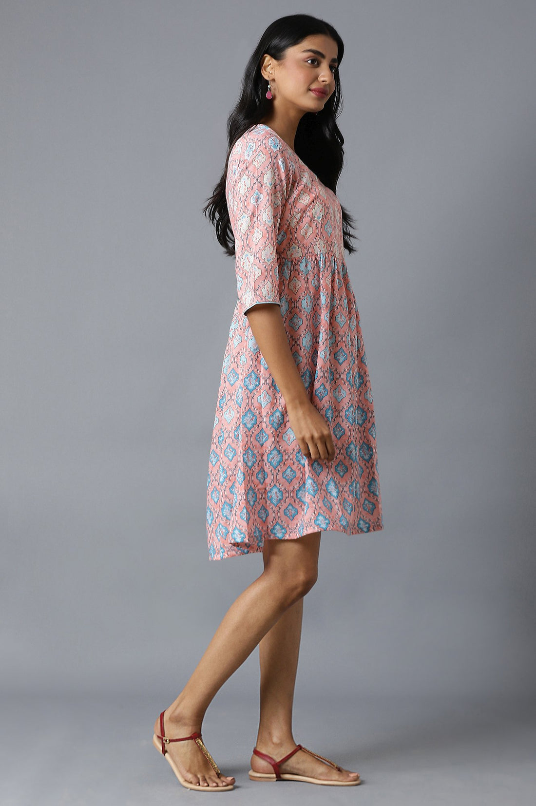 Peach Flared Dress In Floral Print And V-Neck