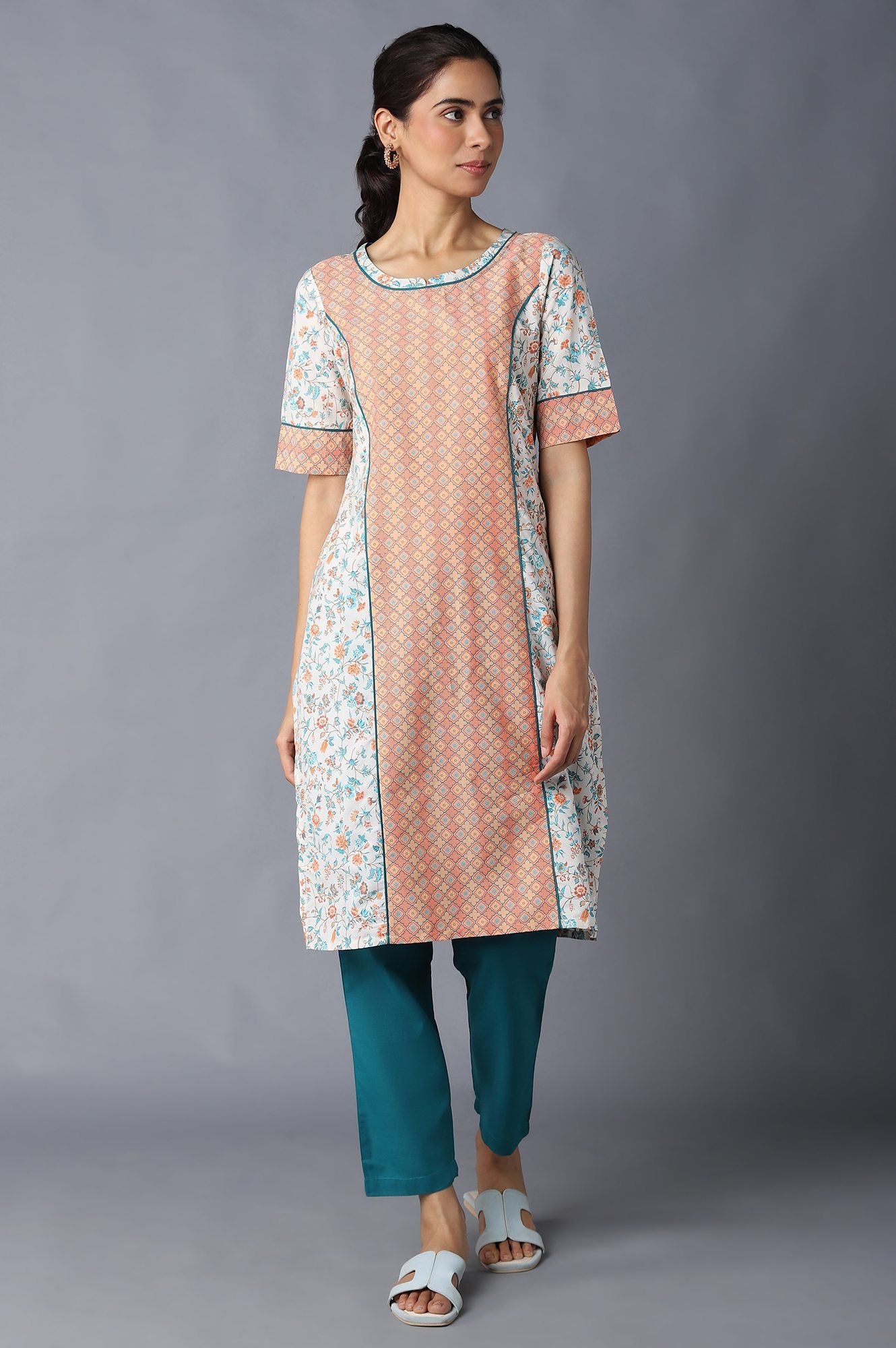 Natural Floral Printed kurta In Round Neck With Teal Green Solid Trousers