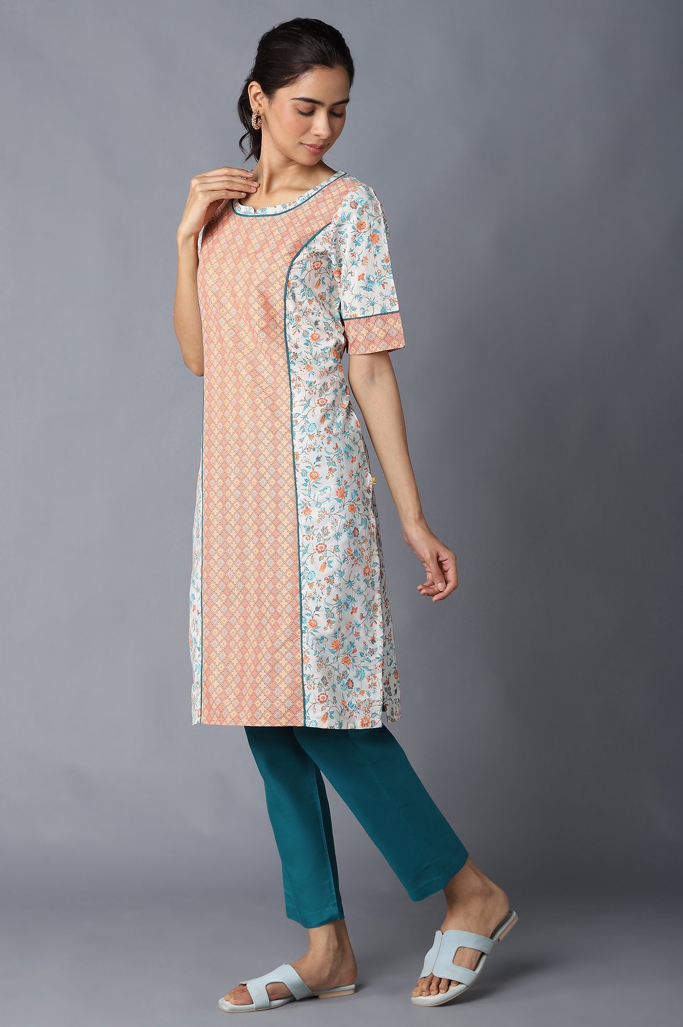 Natural Floral Printed kurta In Round Neck With Teal Green Solid Trousers