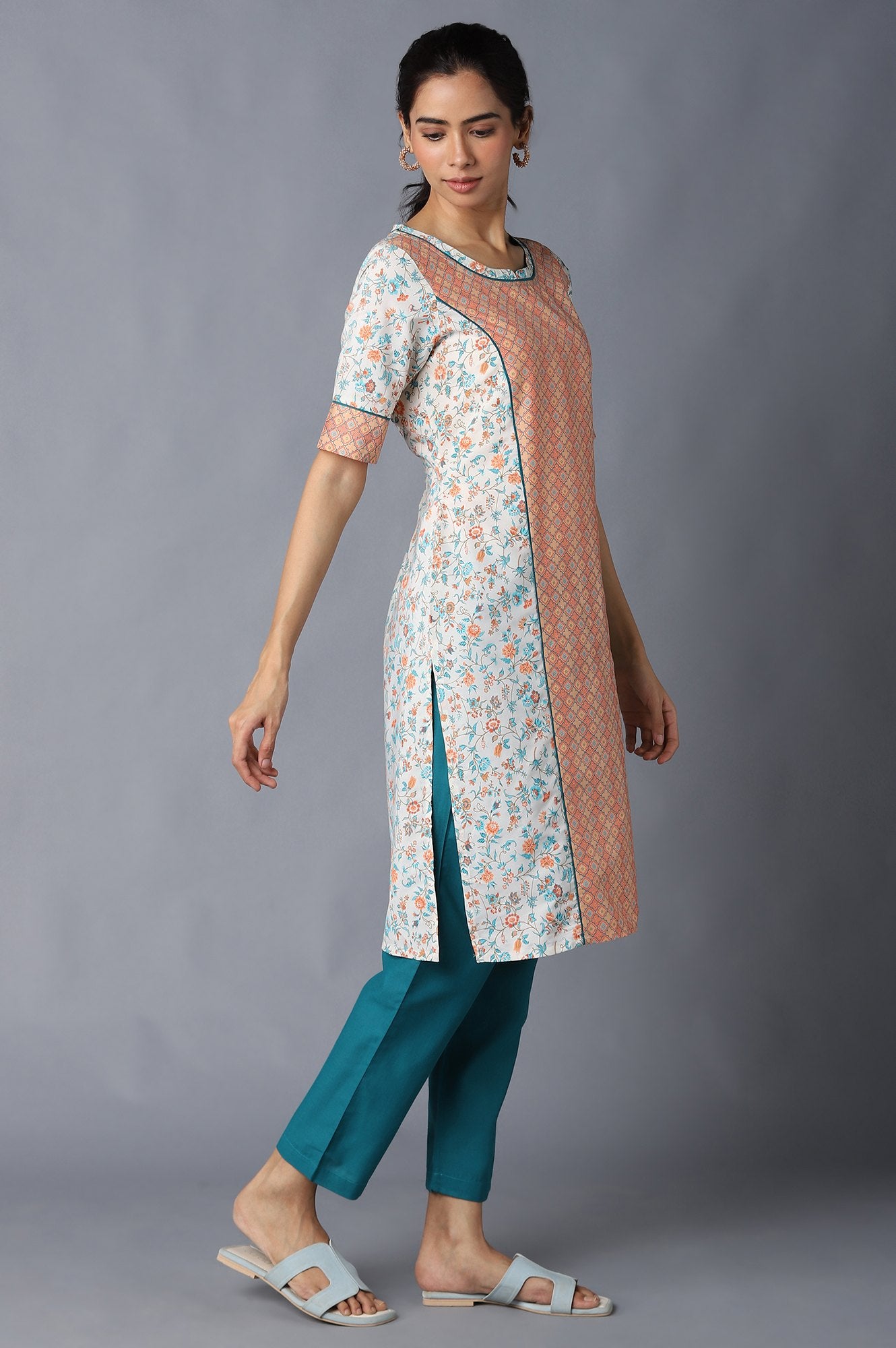 Natural Floral Printed kurta In Round Neck With Teal Green Solid Trousers