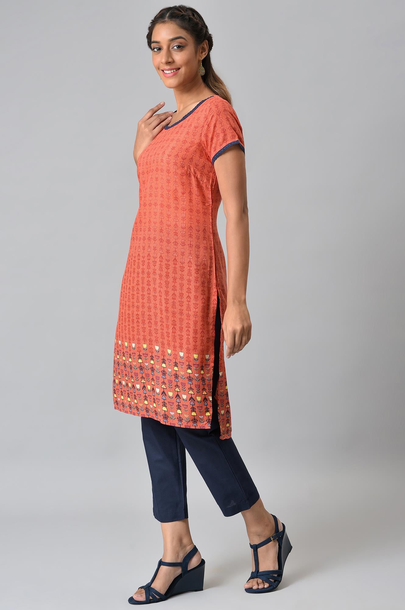 Orange Floral Printed High-Low kurta With Blue Trousers