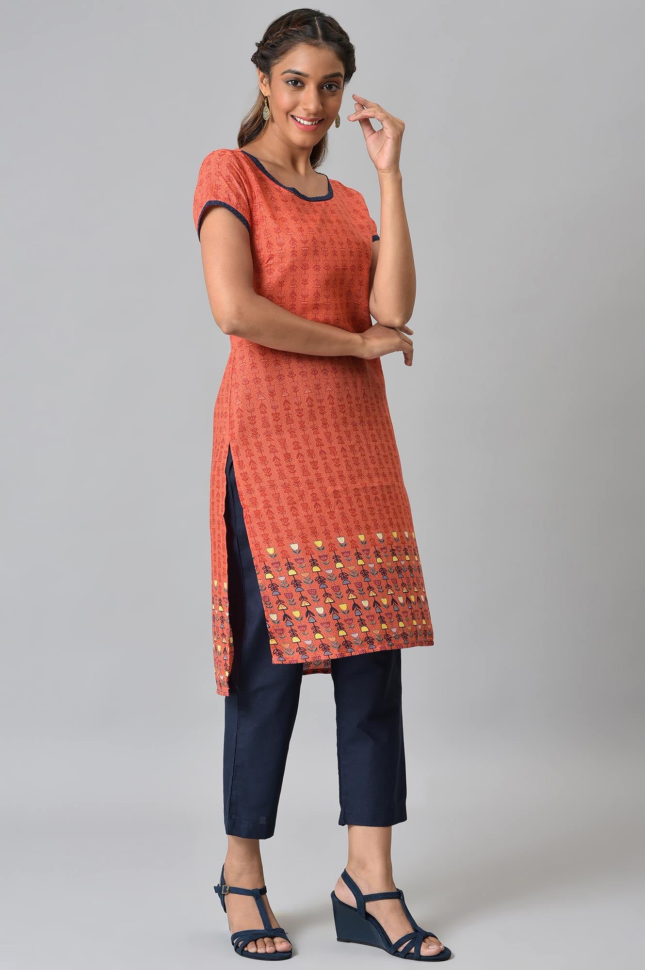 Orange Floral Printed High-Low kurta With Blue Trousers