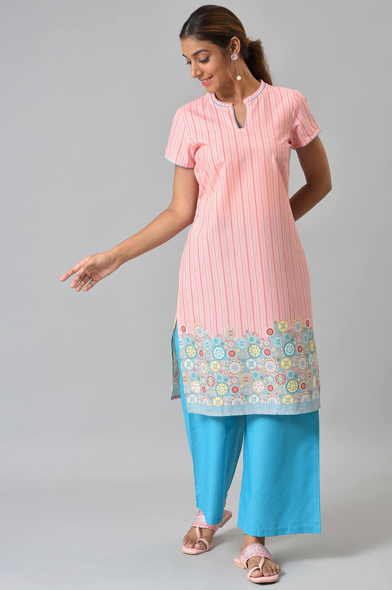 Peach Printed kurta With Blue Palazzos