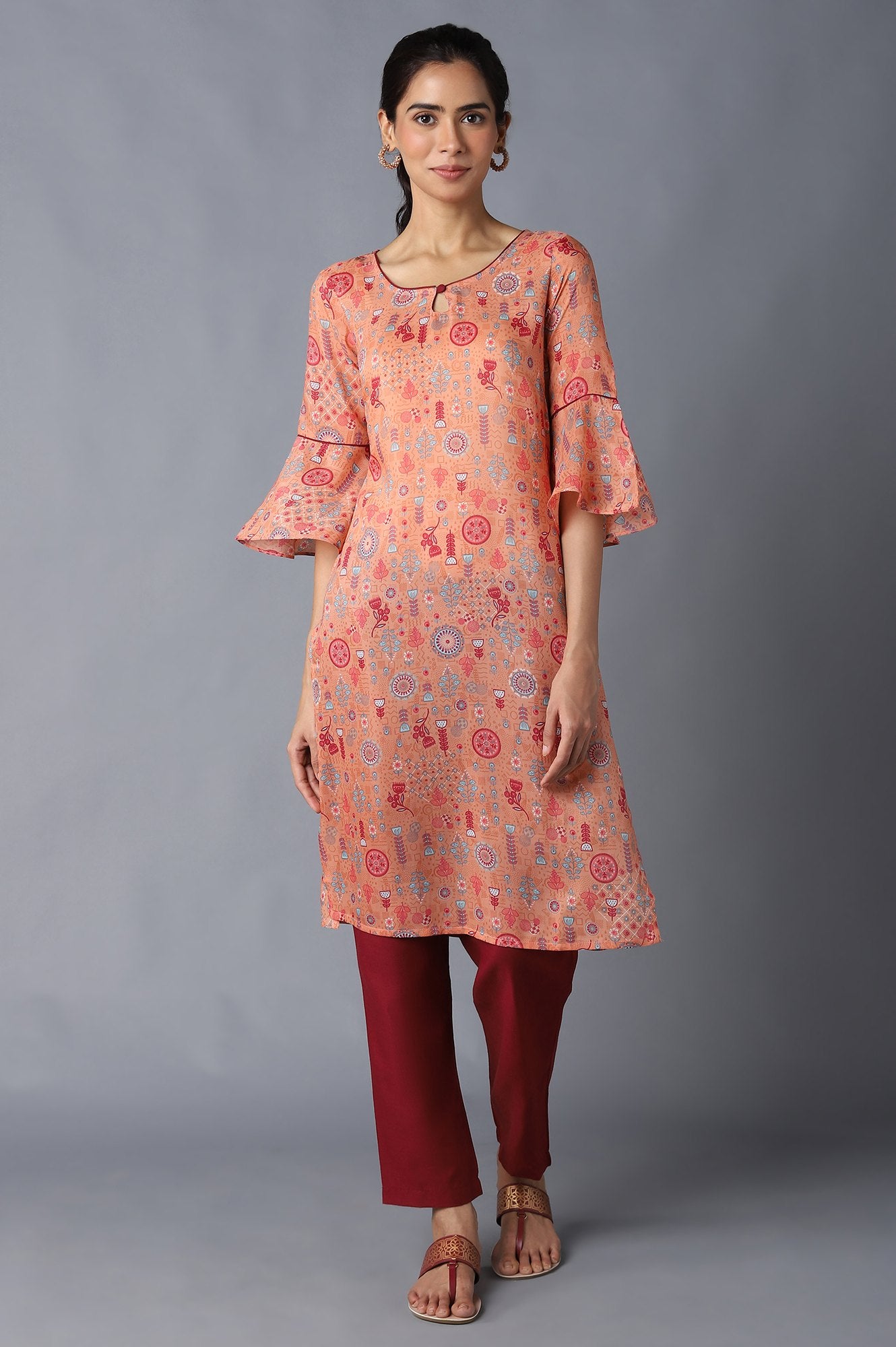 Aure Collection By Aurelia Peach Floral Print kurta With Off-White Trousers