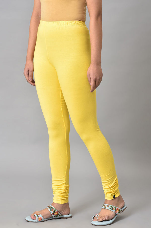 Elleven Women's Yellow Solid Skinny Fit Cotton High Waisted Churidar