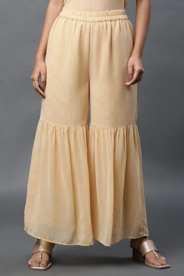 Gold Polka Dots Printed Flared Woven Palazzo With Elasticated Waist