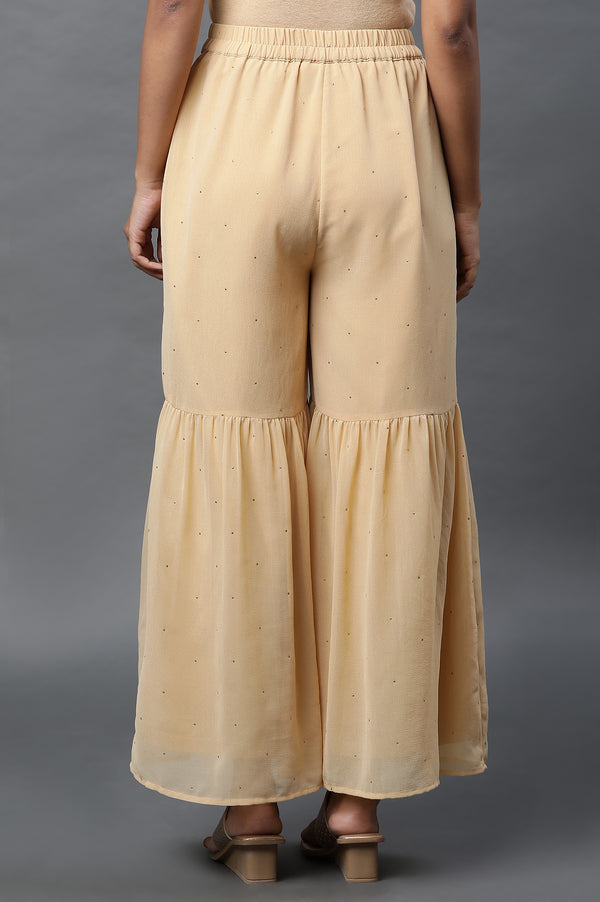 Gold Polka Dots Printed Flared Woven Palazzo With Elasticated Waist