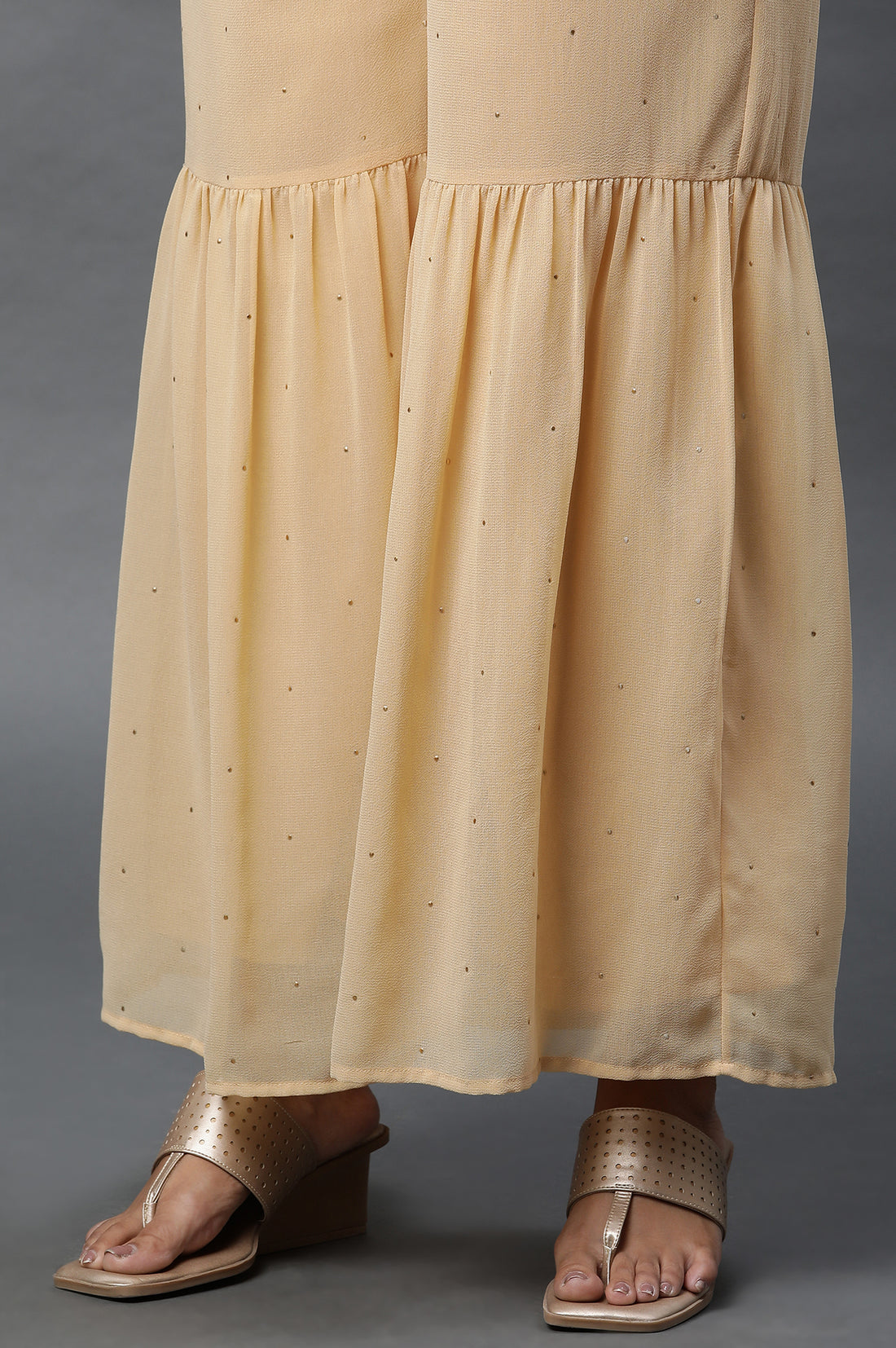 Gold Polka Dots Printed Flared Woven Palazzo With Elasticated Waist