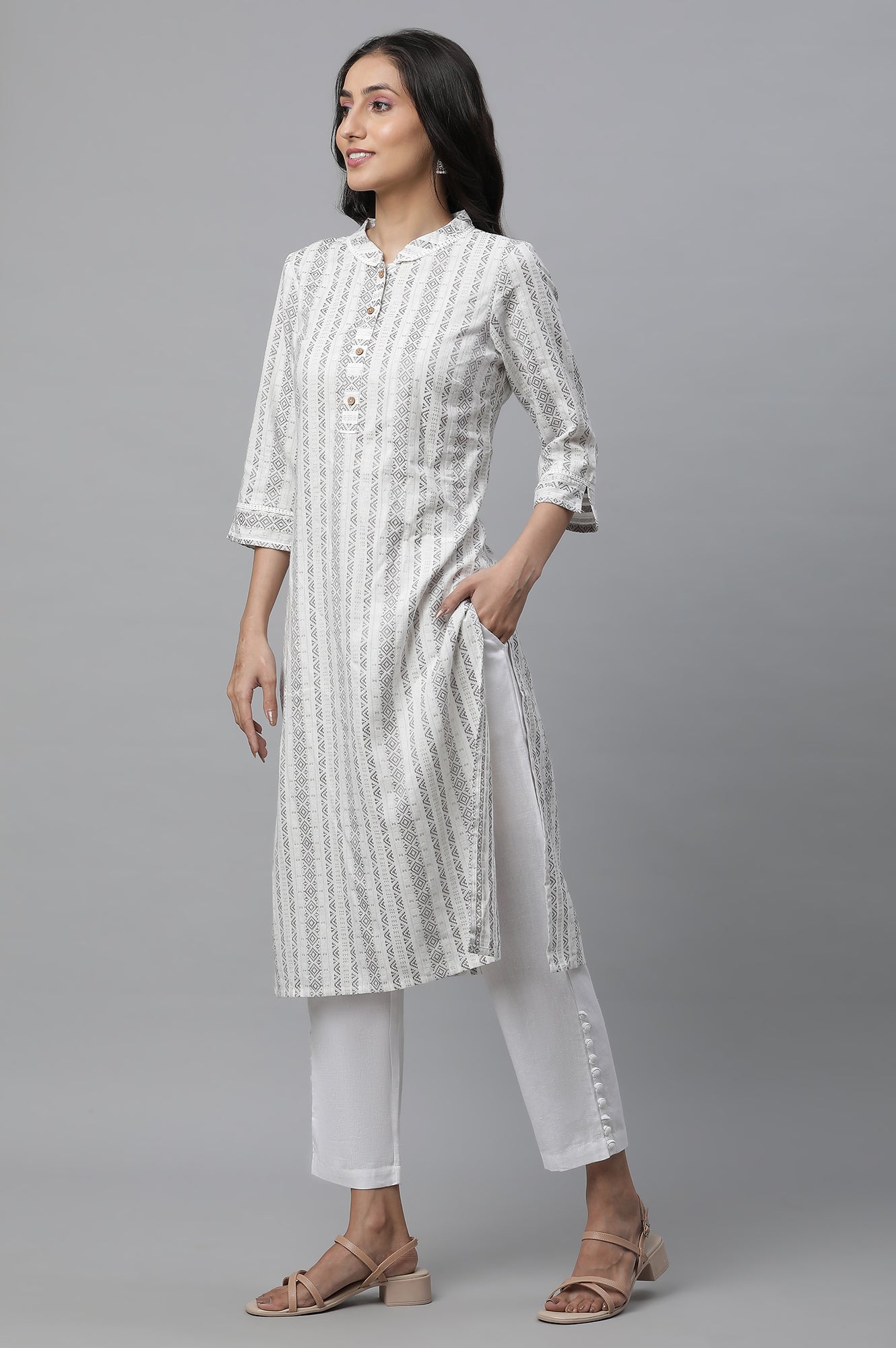 White Narrow Trousers with Buttons on Hemline