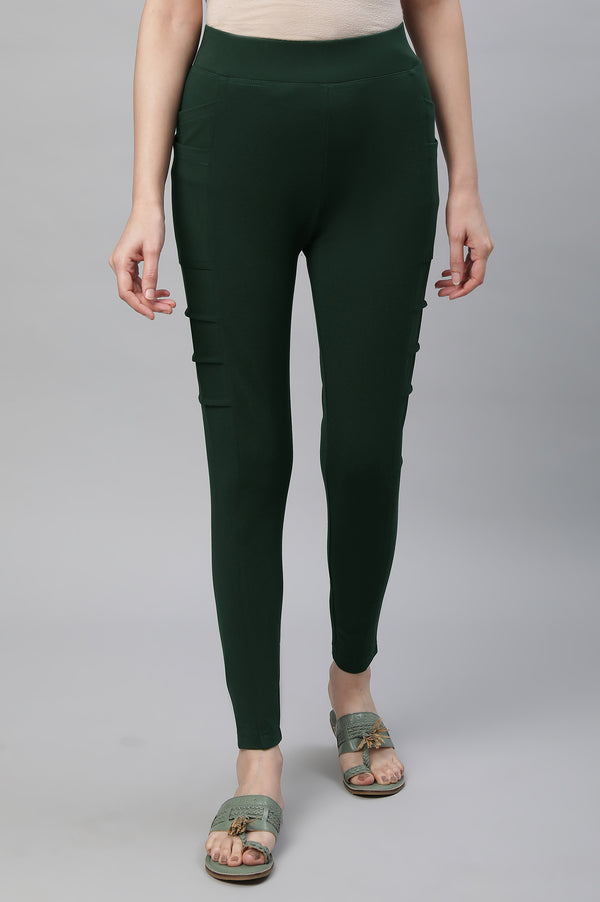 Elleven Women's Bottle Green Solid Skinny Fit Tights With Side Pockets