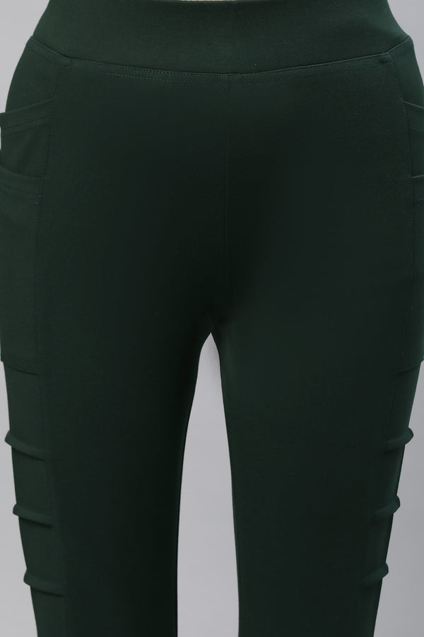 Elleven Women's Bottle Green Solid Skinny Fit Tights With Side Pockets