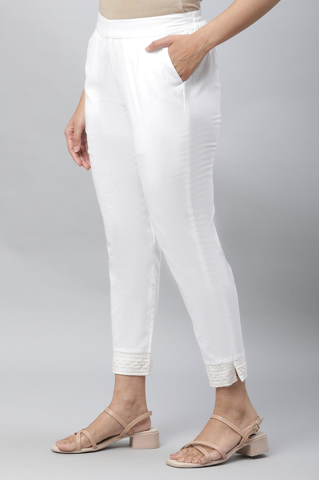 White Solid Straight Fit Cotton Trousers With Embroidered Hemline