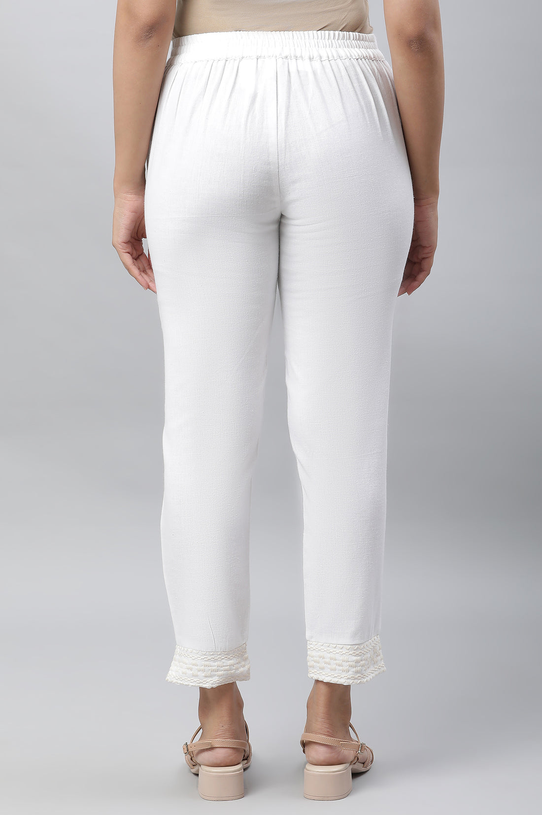 White Solid Straight Fit Cotton Trousers With Embroidered Hemline