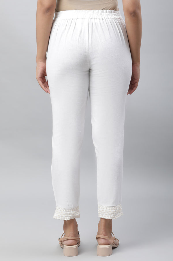 White Solid Straight Fit Cotton Trousers With Embroidered Hemline