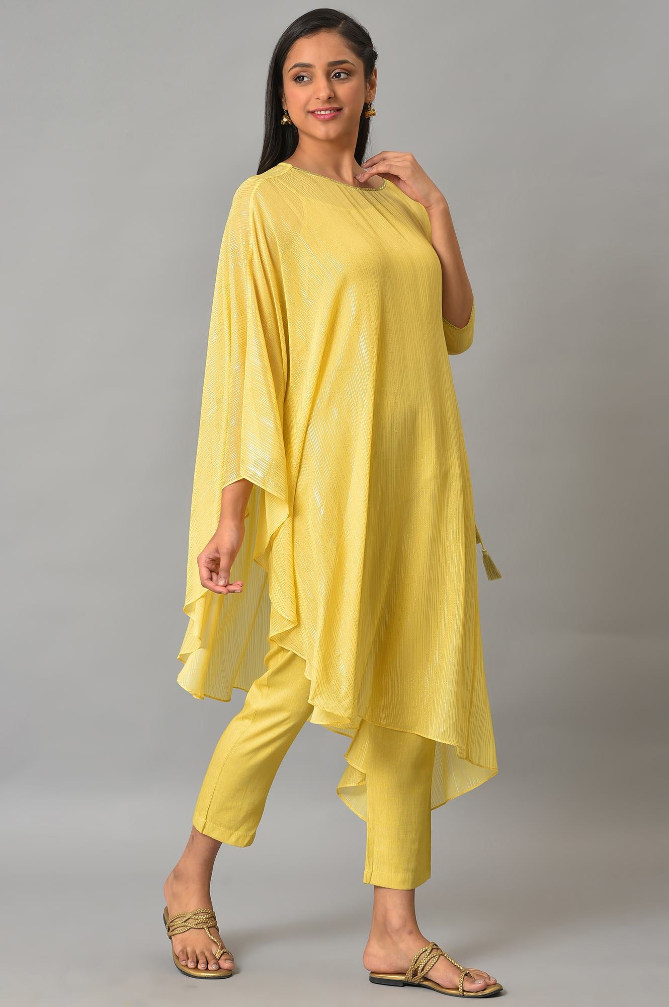 Yellow Assymetric kurta With Inner And Trousers