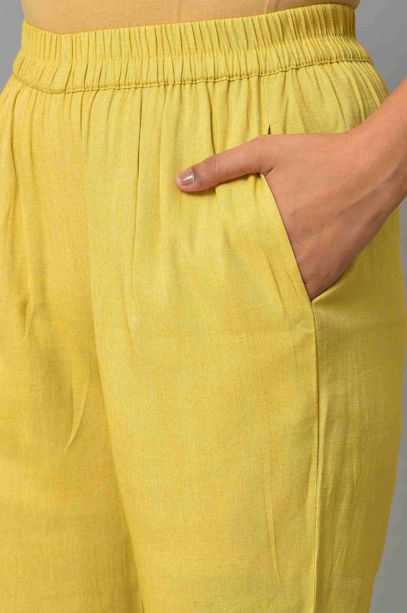 Yellow Assymetric kurta With Inner And Trousers