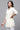 Yellow Cotton Schiffli Floral Embroidered Short Kurti